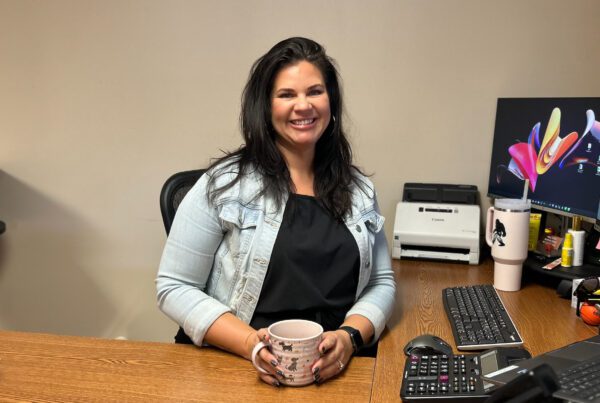 Courtney Seidl at her desk